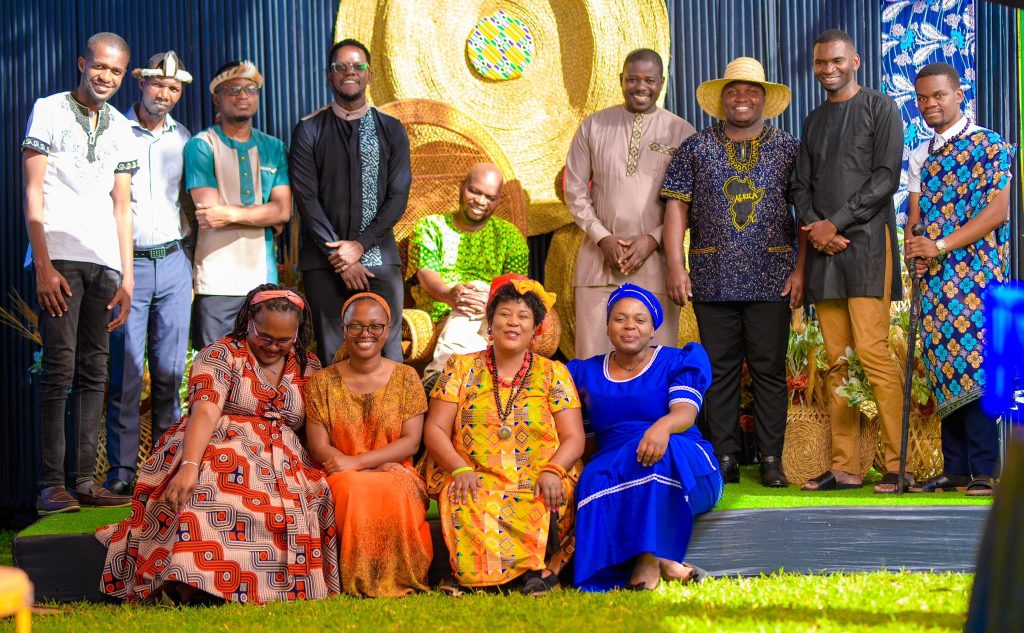 Emeritus RE Malawi MD Christopher Mukwindidza (seated) celebrating Africa day with his team in Blantyre